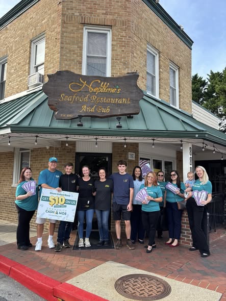 father and daughter playing on the living room floor 